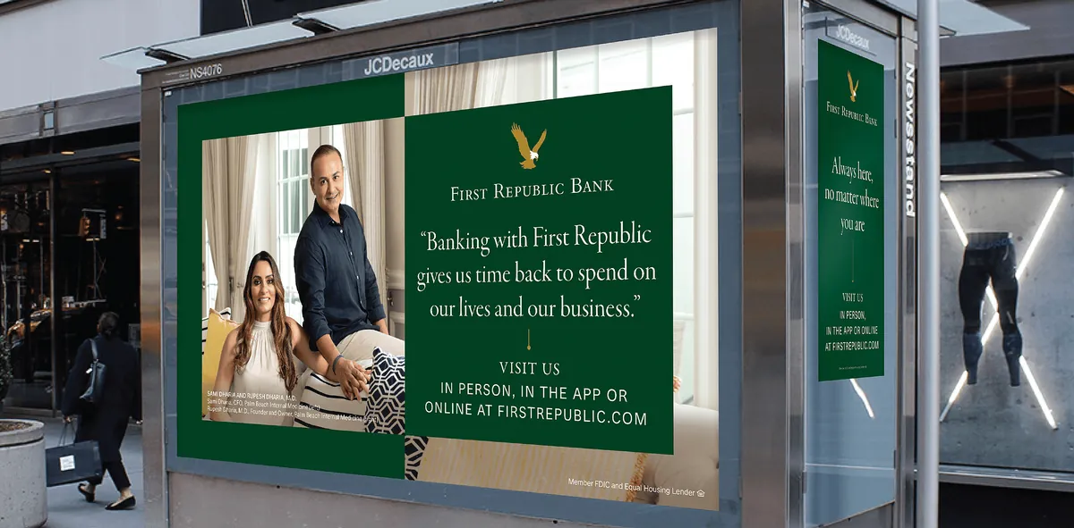 A lit display in Hudson Yards showing a client couple and the quote &ldquo;Banking with First Republic gives us time back to spend on our lives and our business.&rdquo;